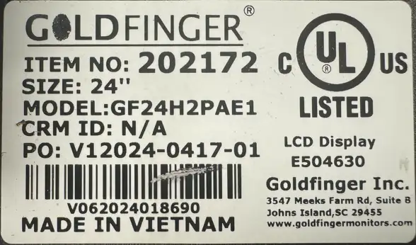 Close-up view of monitor serial number sticker
